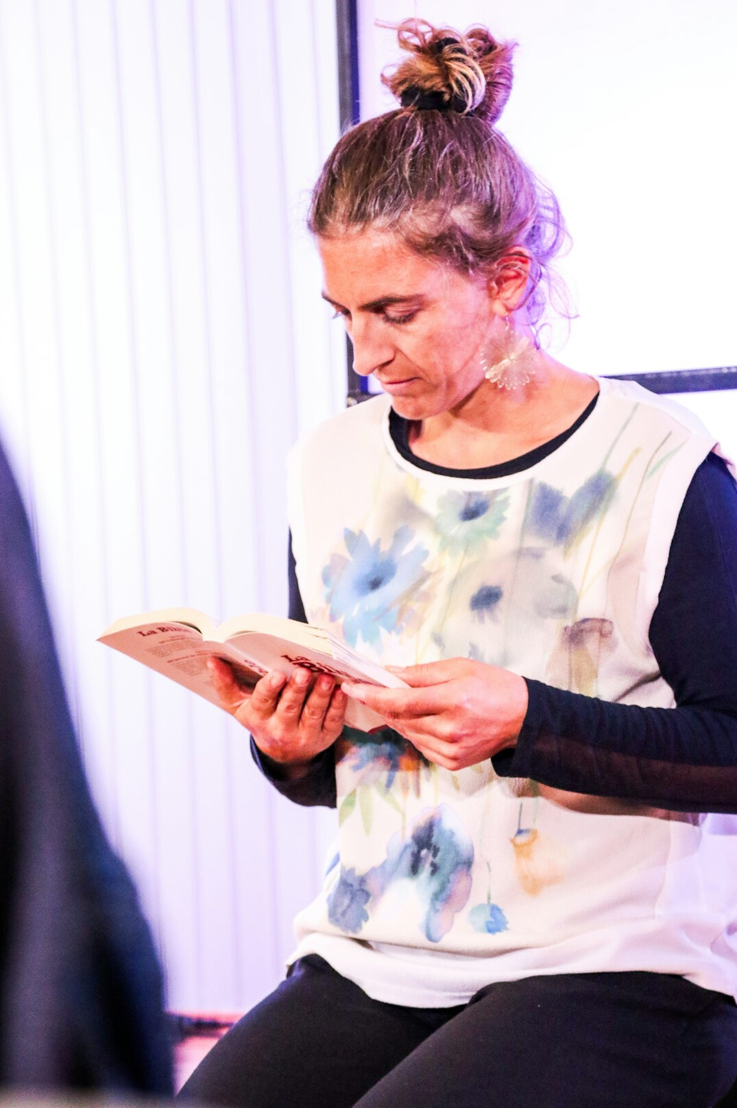 woman reading script