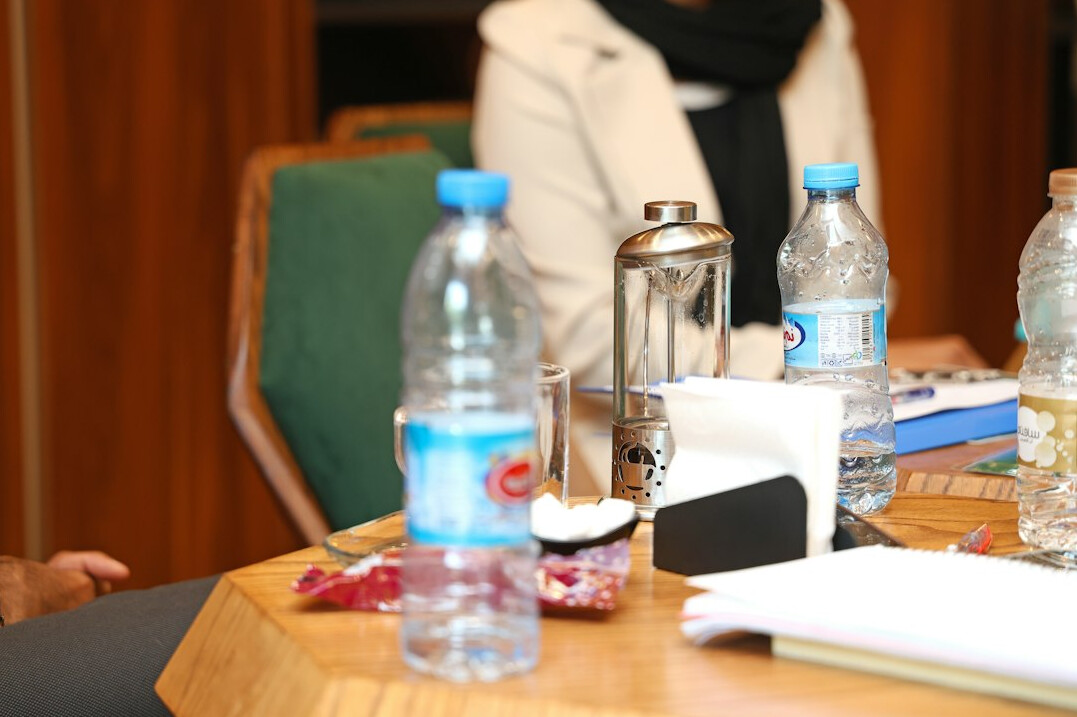 minister in suit at press conference